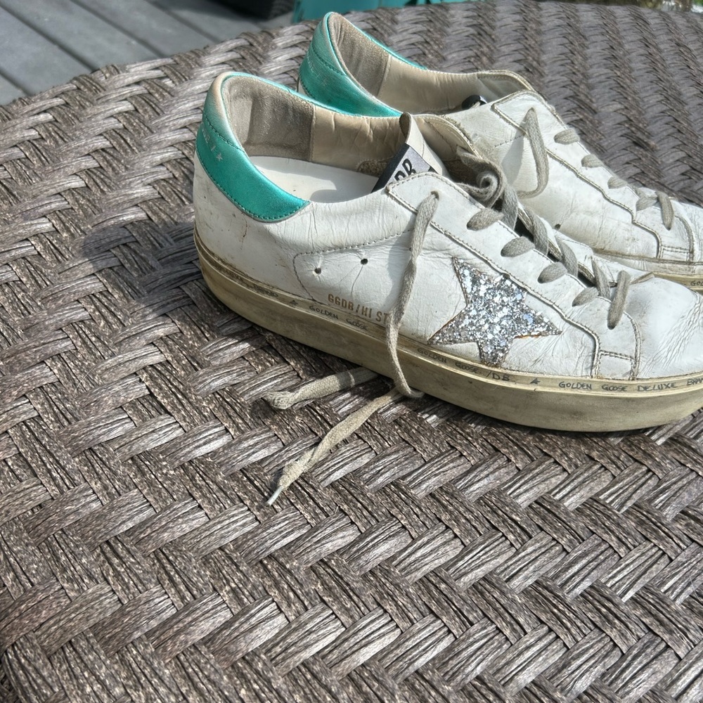 Golden gooses from Bloomingdale’s! Silver sparkly star with grey laces!